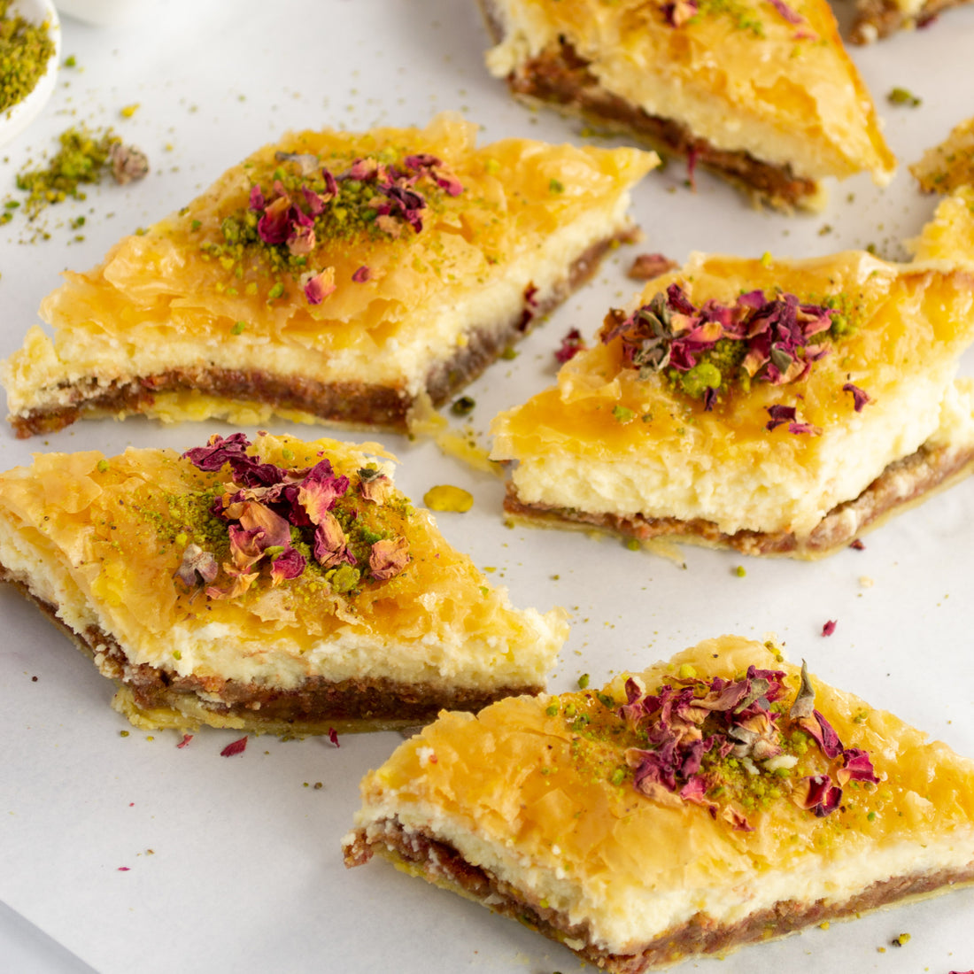 Medjool Dates Cheesecake Baklawa made with Linah Farms' Golden Crown Medjool Dates, pistachios, walnuts, and creamy cheesecake layers.