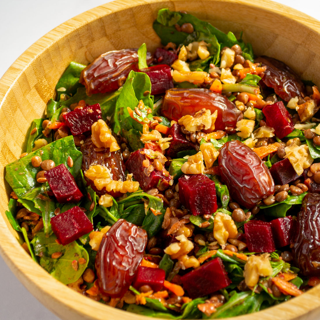 Date Winter Salad with watercress, lentils, roasted beets, Mini Medjool Dates, and a honey balsamic dressing.